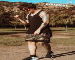 He has several tattoos on his arms, leg, and chest He has several tattoos on his arms, leg, and chest.